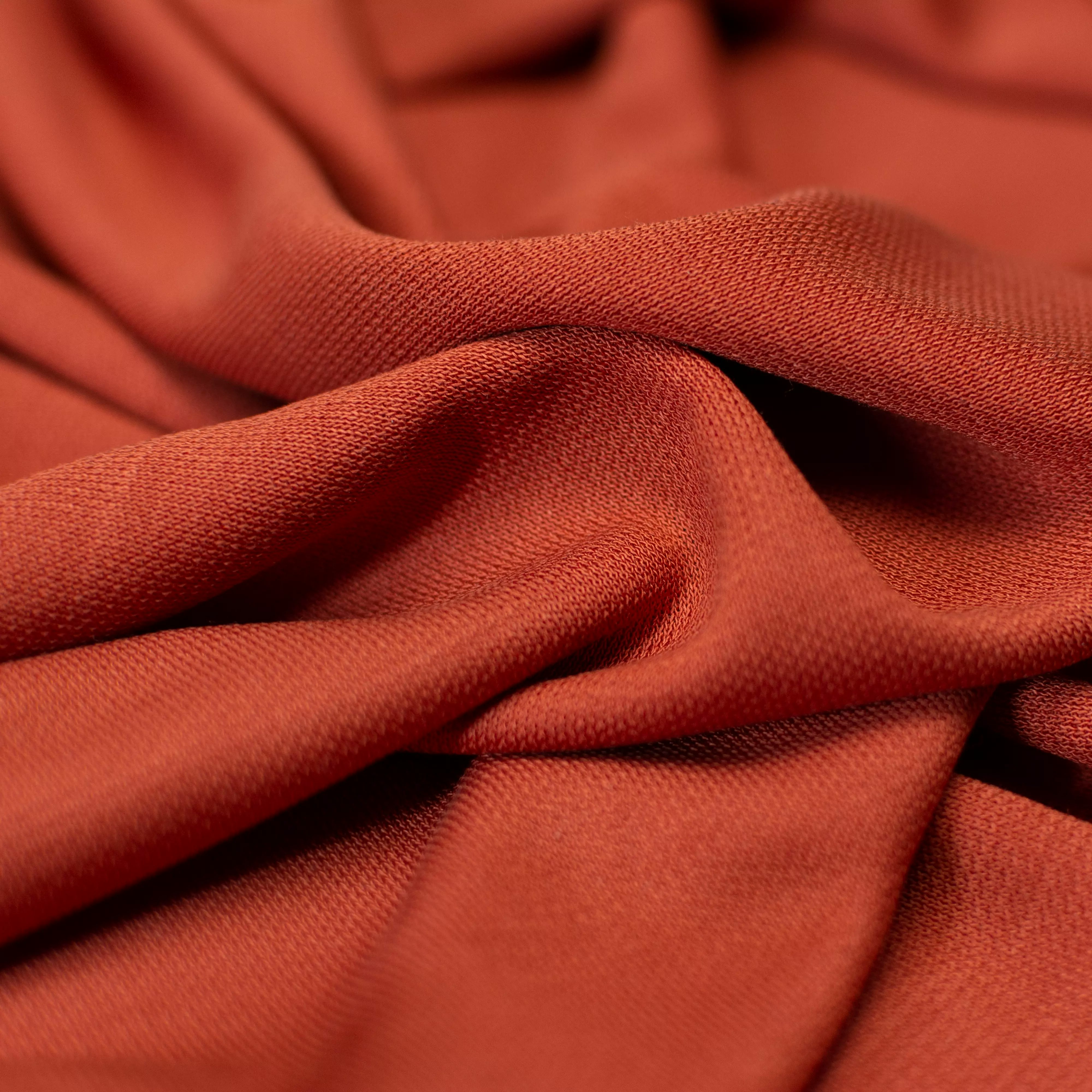 Muster: Tencel - Interlock - rostiges Orange